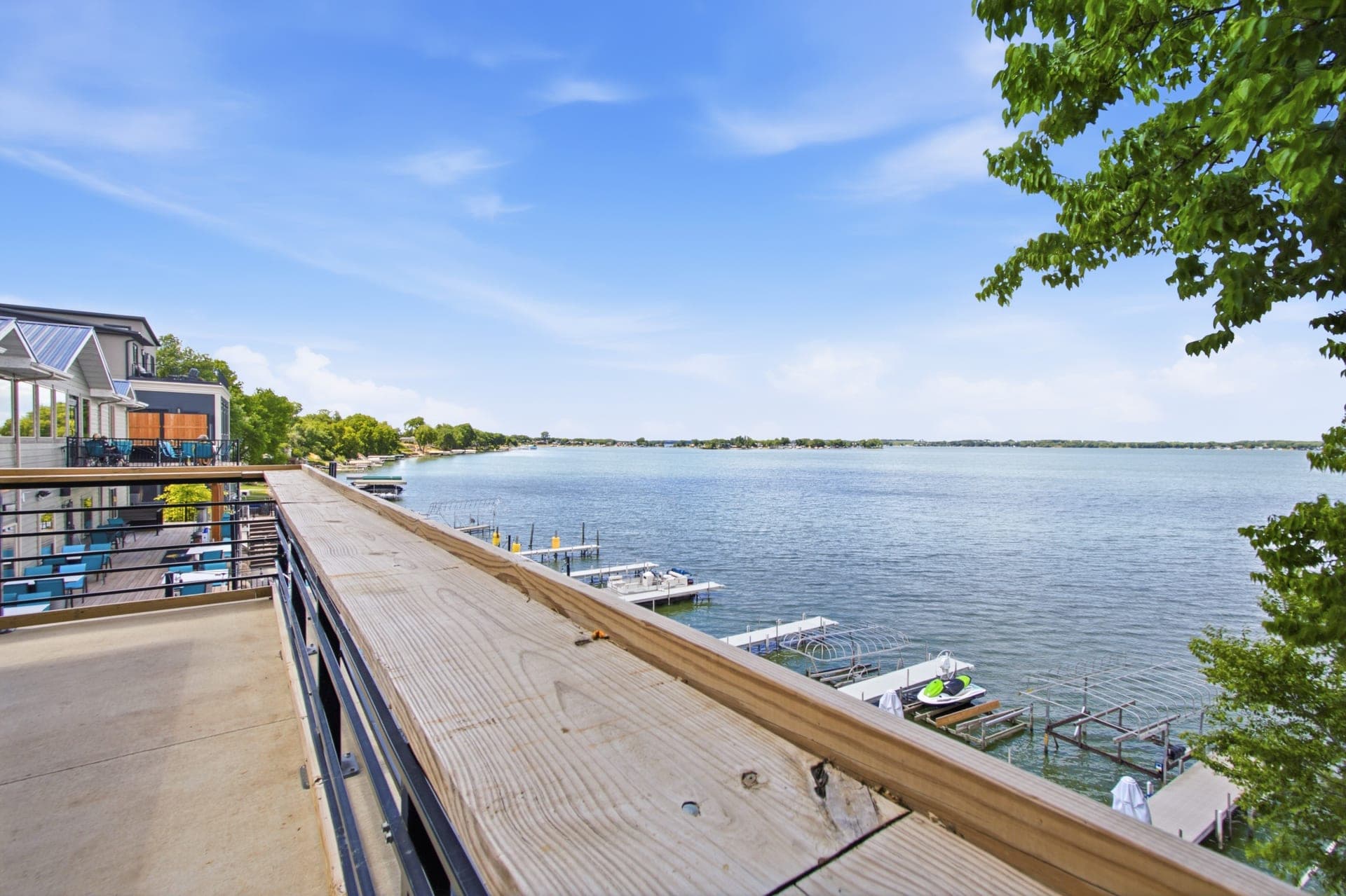 Docks and boats on the water at The Hillside